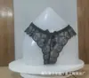 Tanga sexy de encaje europeo y americano para mujer, cintura baja, cadera, lazo, lencería sexy sexy, venta al por mayor, generación