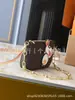Fornecimento Exclusivo Transfronteiriço de Bolsas Clássicas de Designer, Bolsas de Corrente com Rebites Atacado Europeu e Americano, Bolsas Pequenas de Mão, Bolsas de Pelúcia com Caixa