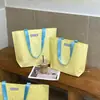 Bolsa tejida de alta gama, color liso, con cierre de broche oculto para tiendas de ropa, empaque de ropa para mujer, empaque de regalo al por mayor