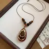 Nuevo collar colgante geométrico de resina con degradado estilo chino, cadena para suéter estilo étnico vintage, accesorio de diseño de nicho a la moda