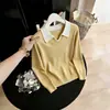 Suéter de punto cálido de manga larga, con cuello en V suave y acogedor, de bloques de color, inspirado en el diseño Otoño/Invierno 2026