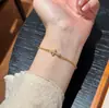 Pulsera de Anillo Corredizo Cruzada Exquisita Retro Francesa Diseño de Nicho Moda Lujo Ligero Gama Alta Simple Versátil Joyería