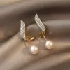 Aretes de Aguja de Plata S925 Coreanos Nuevos Explosiones Aretes para Niñas Temperamento Simple Joker Aretes Tono Agitado con Aretes Venta al por Mayor