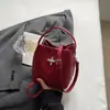 Bolso tipo cubo nuevo para principios de otoño de 2026, bolso cruzado de hombro elegante de color liso, único y a la moda, bolso de mano de alto valor estético
