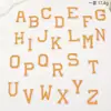 Amazon transfronterizo caliente multi-color letras bordado por computadora tela pegatinas DIY zapatos y sombreros bolsos textil auxiliar autoproducido