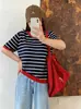 Suéter tejido a rayas vintage para mujer talla grande, colección otoño 2026, camiseta base de cuello redondo de punto holgado con bloques de color para mujer talla grande