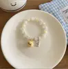 Pulsera Linda Nueva Alto Valor de Color Gatito Perro Cerámica Pareja Nicho Diseño de Cuerda para la Mano Novia Pulsera Desgastada