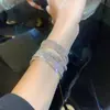 Pulsera elástica de cristal de fila única color diamante distintiva exquisita de moda todo partido pulsera de lujo ligero joyería de alta gama para mujer