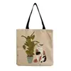 Directo de fábrica estilo coreano bolso de hombro práctico de dibujos animados moda versátil bolsa de mano lindo gato estampado bolsa de compras