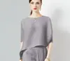 026 Top plisado para mujer, diseño moderno, estilo nicho Issey Miyake, nueva camiseta asimétrica holgada talla grande, elegante para mujer