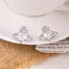 Brincos de Coração Planeta com Zircônia Banhados a Ouro Real Moda Europeia e Americana Estilo Cool Acessível de Luxo Nicho Brincos de Alta Qualidade