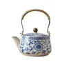 Tetera de Cerámica Ru Kiln con Esmalte Agrietado Anti-quemaduras, Tetera Azul y Blanca con Asa de Flor de Loto para Uso Doméstico, Venta al por Mayor Logo Personalizado
