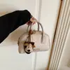 Bolsa de mão estilo ins coreano, bolsa almofada para mulheres, nova bolsa Boston de verão 2026 para trabalho e deslocamento, bolsa de ombro e transversal