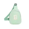 2026 Nova Bolsa de Comércio Exterior Infantil Estilo Coreano Moda Letra Bolsa de Peito para Meninos e Meninas Casual Cor Sólida Bolsa Transversal de Bebê