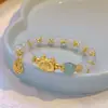 Nueva pulsera de esmalte de mariposa femenina ins nicho lujo ligero Mori azul marino cuentas de colores craqueladas hielo pulsera de amigas al por mayor