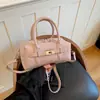 Bolso de mano de moda simple y versátil para mujer, nuevo modelo primavera 2026, bolso cruzado y de hombro casual elegante de alta gama