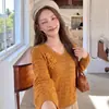 Suéter de punto con cuello en V y diseño floral tridimensional calado para mujer, nuevo diseño de primavera y otoño 2026, top tipo suéter de estilo holgado y casual