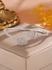 RAKOL Moda Luxo Leve Cobre Incrustado Zircônia Trevo de Quatro Folhas Aberto Ajustável Pulseira Feminina Nicho Toque de Alto Padrão Joia de Mão