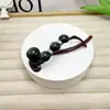 Pinza para el pelo retorcida de perlas con forma de flor para mujer, estilo de alta gama, nuevo modelo 2025, pinza para moño informal para la parte trasera de la cabeza, pasador