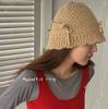 Gorro de lana de moda para mujer ins versátil nicho Corea del Sur nuevo estilo mismo otoño e invierno lazo tejido sombrero de pescador