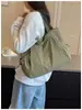 Bolsa de Lona Feminina 2026 Nova Moda Casual Outono/Inverno Bolsa Tote para o Dia a Dia Bolsa de Ombro de Grande Capacidade