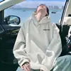 Nueva sudadera con capucha holgada de otoño e invierno para hombre y mujer, de manga larga, estilo estudiantil, chaqueta casual estampada versátil