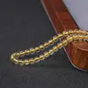 7A cuarzo rutilado dorado natural cuentas sueltas accesorios DIY pulsera de cuentas de cristal hecha a mano accesorios de joyería al por mayor