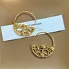 Pendientes de Oro con Patrón Hueco de Semicírculo con una Textura de Elegancia Francesa Vintage, Artesanía Exquisita y un Estilo Vintage Sofisticado para Mujeres