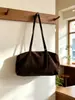 Otoño/Invierno 2026 Nuevo Estilo Coreano Vintage Casual Gran Capacidad Bolso de Hombro Único Tipo Almohada Versátil Simple para Viajes Diarios Bolso de Axila