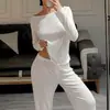 Conjunto de Pijama Feminino 2026 Outono/Inverno Novo Estilo Europeu e Americano Malha de Algodão Escovada com Flocos de Neve Amigo da Pele Confortável Manga Longa Calça Longa