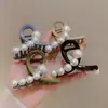 Clip para el Cabello de Aleación con Perlas Estilo Coreano y Japonés Nuevo Primavera 2025 Accesorios para Mujer Clip de Tiburón Dulce de Moda Yiwu Accesorios para el Cabello