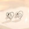 Pendientes entrelazados de amor de oro auténtico bañados en cobre de gran venta transfronteriza, pendientes de mujer elegantes y sencillos con forma de corazón de amor a la moda de Corea del Sur.