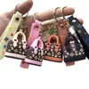 Llavero colgante de bolsa de burro simulada transfronteriza, colgante de minibolso estilo Chanel, muñeca linda regalo pequeño al por mayor