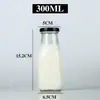 Botellas de Vidrio Transparente para Yogur Directo de Fábrica 200ml 250ml 300ml 500ml Botellas de Vidrio para Leche Fresca con Tapas de Hierro