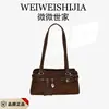 Moda Retrô Simples Versátil para o Dia a Dia Pingente de Estrela Camurça Outono 2026 Nova Bolsa de Ombro Único Portátil de Braço