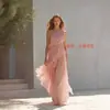 Playa de estilo resort francés junto al mar 2026 verano nuevo vestido de color liso sin mangas con volantes y cuello halter