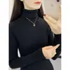 Suéter de cuello alto para mujer OEM 2026 otoño e invierno nuevo estilo coreano color liso manga larga corte ajustado jersey corto capa interior gruesa