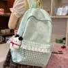 Mochilas transfronteiriças, estilosas e de alta qualidade em estilo preppy, adequadas para meninas do ensino fundamental II, com grande capacidade e projetadas tanto para o ensino fundamental II quanto para estudantes universitários.; atacado disponível