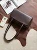 La fila bolso de bolos Astra otoño/invierno, bolso de mujer de piel de oveja de capa superior, bolso de hombro simple, bolso nuevo para debajo del brazo