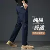 Calça casual masculina de algodão puro de alta qualidade, nova para outono de 2026, corte reto slim fit, calça longa versátil cinza escuro para homens de meia-idade