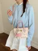 Bolsa de mão da moda e super popular para comércio exterior, nova bolsa versátil feminina para o verão de 2026, bolsa transversal com toque de luxo, bolsa tote pequena