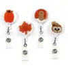 Porta credencial retráctil con parche adhesivo de ABS con bordado de tela de calabaza, fantasma y calavera