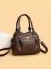Bolsa Transversal Feminina 2026 Nova Bolsa de Mão em Couro Macio Bolsa de Ombro Simples Versátil para Mães de Meia-Idade Comércio Exterior Transfronteiriço