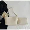 Bolso de mano de punto con patrón de tejido de moda transfronterizo para mujer, nuevo bolso cubo vintage de alta gama, bolso de hombro para llevar debajo del brazo