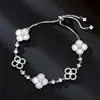 Pulseira de Concha com Grama da Sorte Zircônia Microincrustada Luxo Leve Ajuste Deslizante para Mulheres Joia de Pulseira Refinada de Alta Qualidade