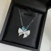 Conjunto de Brincos Versa Brilliant Pedra Preciosa Coração Pêssego Banhado a Ouro 18K Joia Pingente de Colar Laço de Amor Zircônia Cor Pêssego