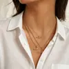 Collar para mujer estilo europeo y americano Wanxing, juego de collar con colgante de barra en T de circón de acero inoxidable chapado en oro de 18 quilates, estilo clásico, venta al por mayor transfronteriza