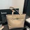 Bolsa de mano casual estilo coreano para mujer, nuevo bolso de mano vintage, bolso de hombro de moda de gran capacidad para el trabajo