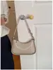 Bolsa de temperamento da moda novo senso pequena estilo Chanel bolsa de ombro único transversal moderna leve feminina versátil de axila crescente bolsa de ombro único