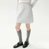 Falda midi de punto de cachemira para mujer con textura de patrón de rombos, nuevo estilo otoño/invierno, de cintura alta, corte A, engrosada, cintura elástica